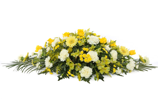 Yellow casket spray